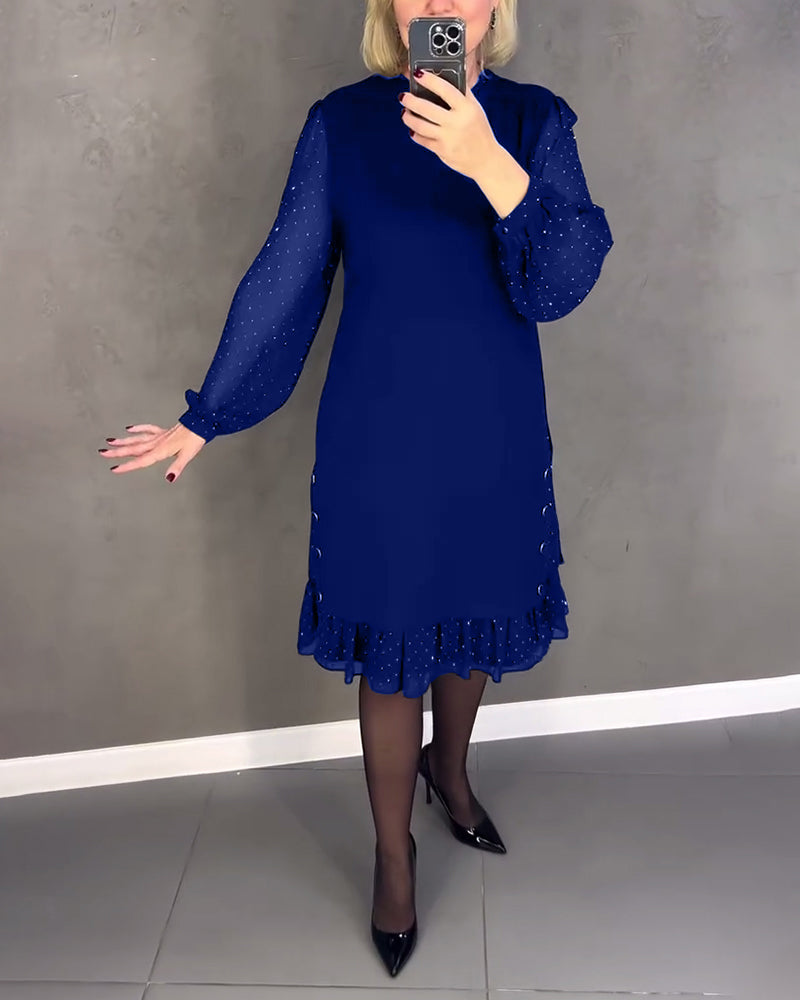 Elegant dress with long sleeves and polka dots